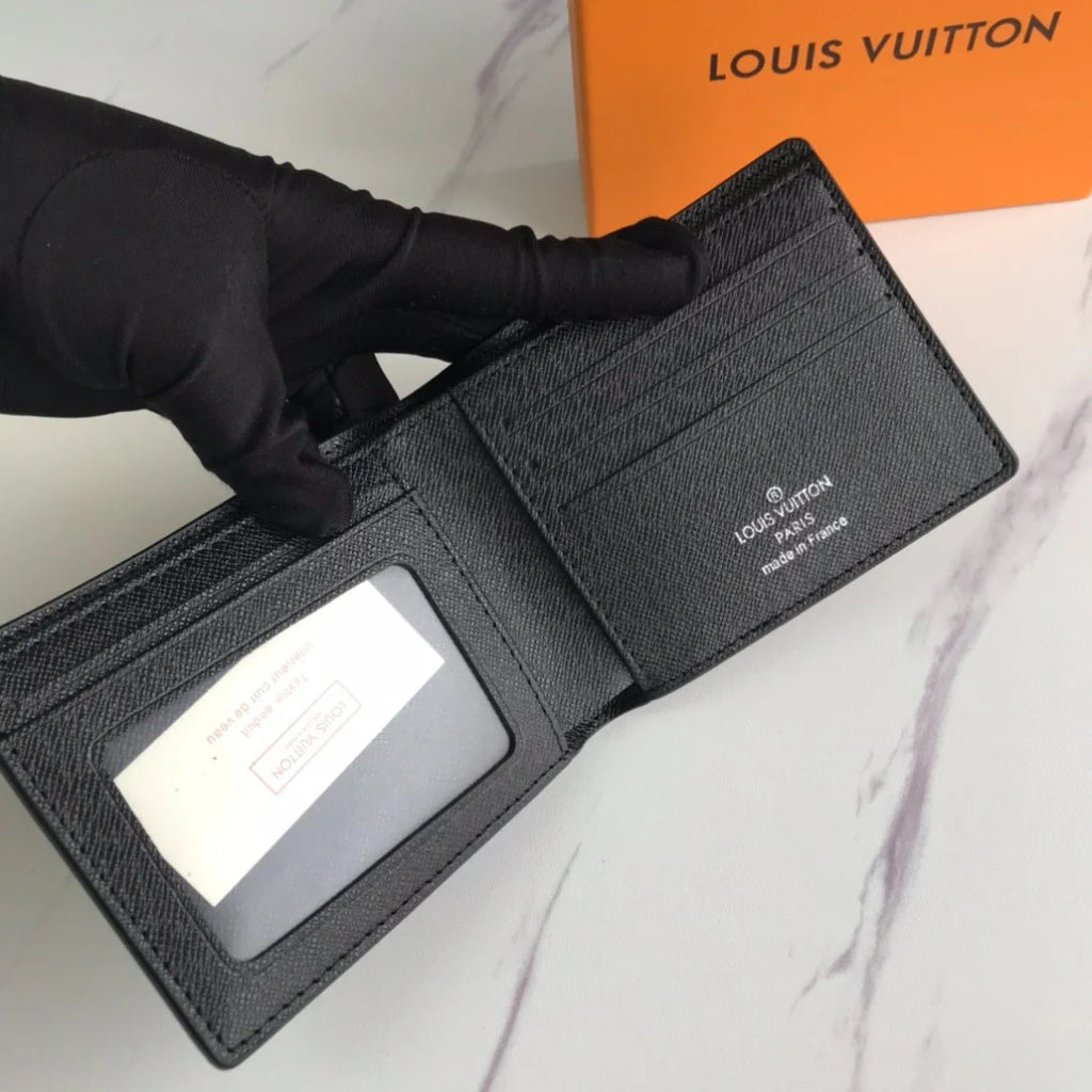 Louis Vuitton: Premium Leather Wallet - Accessible Luxury Edition.